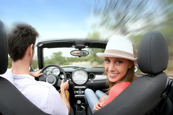 Couple driving car — Stock Photo, Image