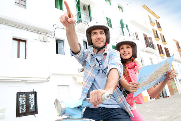 Tourists in Ibiza with map