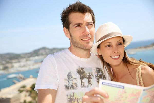 Tourists reading map