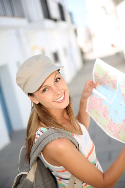 Girl holding map — Stock Photo, Image