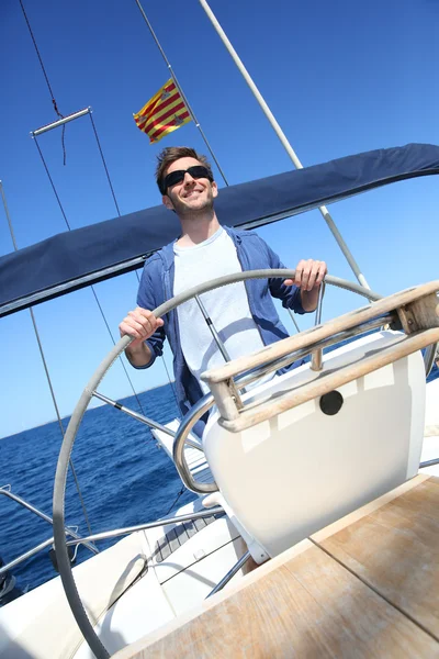 Skipper on sailboat — Stock Photo, Image