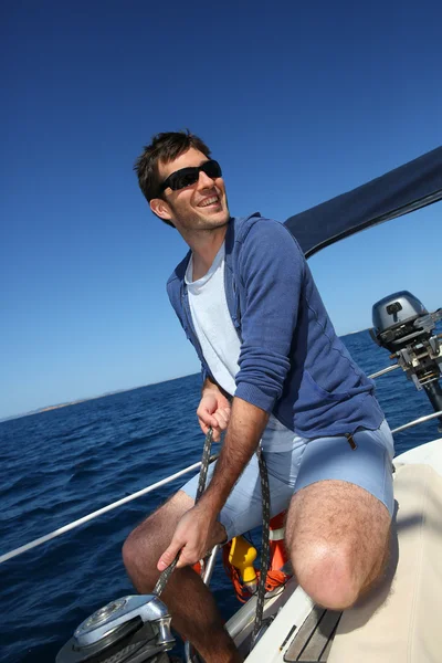 Skipper in mediterranean sea — Stock Photo, Image