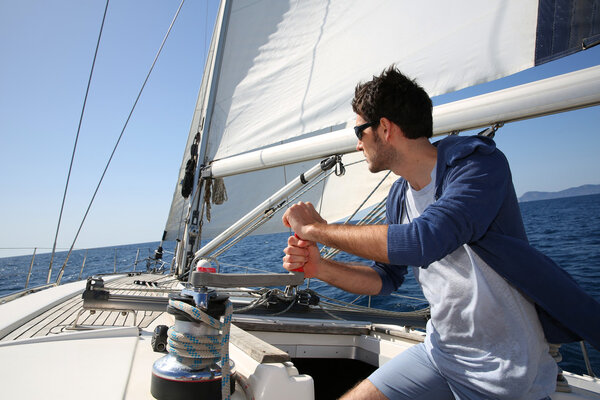 Man sailing with sails out
