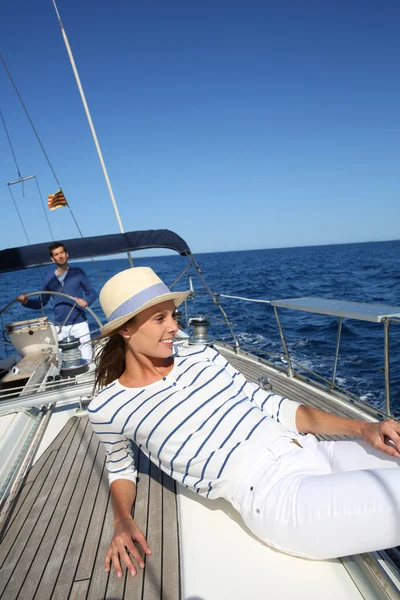 Woman lying on boat — Stock Photo, Image