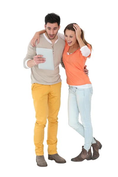 Couple using digital tablet — Stock Photo, Image