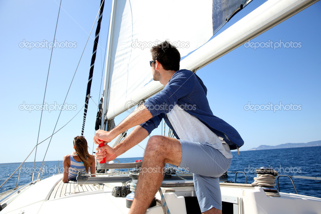 Skipper navigating in mediterranean sea