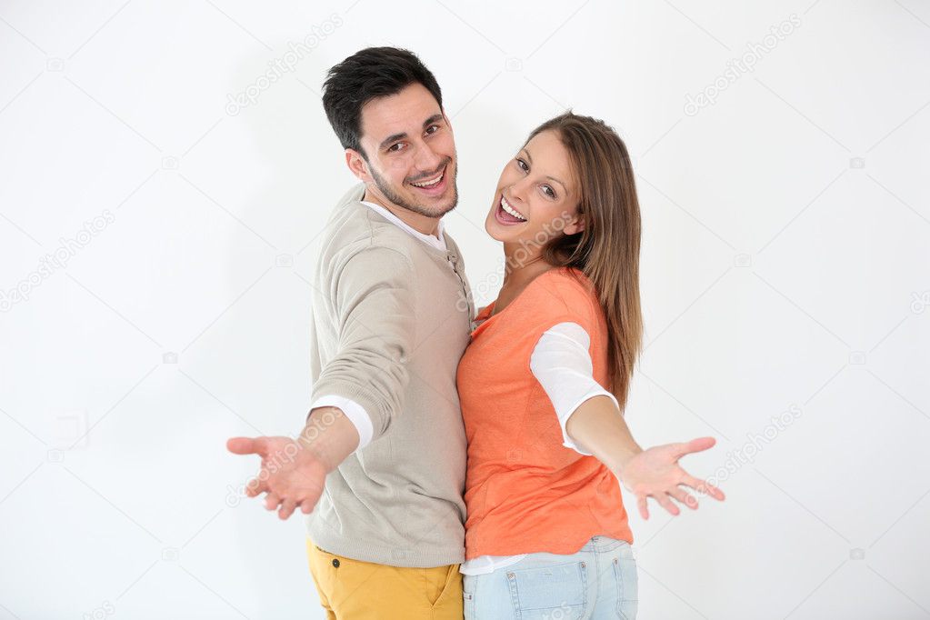Couple spreading arms