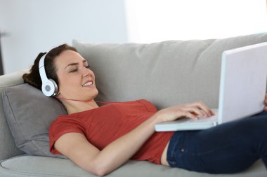 Woman chatting on internet clipart