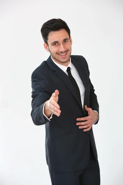 Businessman giving handshake — Stock Photo, Image