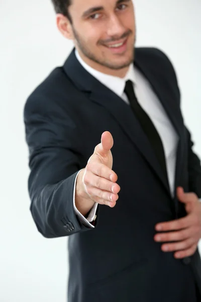Biznesmen dając uścisk dłoni — Zdjęcie stockowe