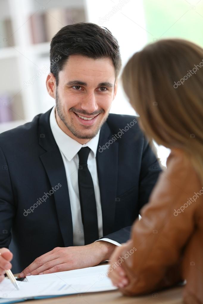 Woman meeting adviser in office