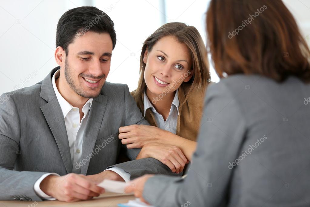 Couple meeting financial adviser