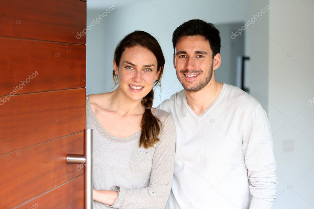 Couple opening door