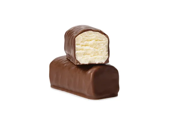 Glazed cheese in milk chocolate broken into halves on a white isolated background