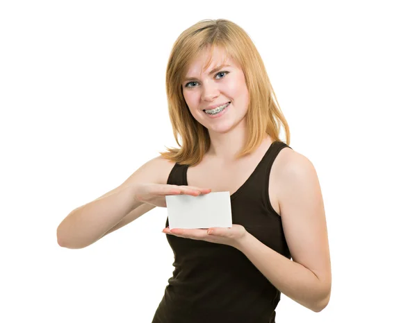 Ung flicka med parentes hålla blankt papper isolerade på vit baksida — Stockfoto