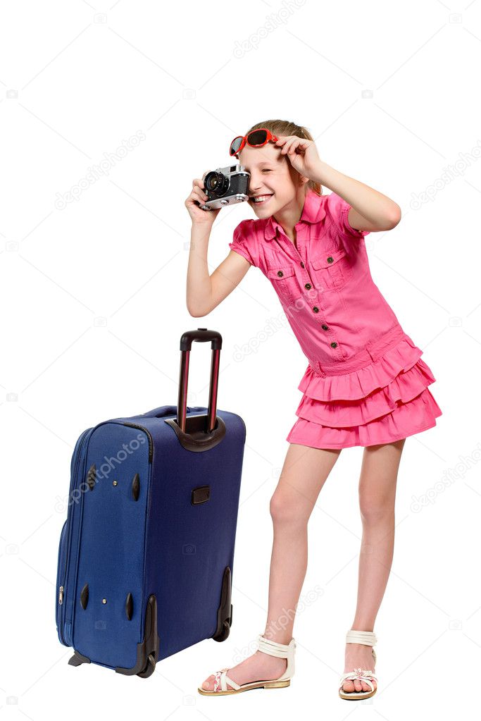 girl with suitcase and old style photocamera