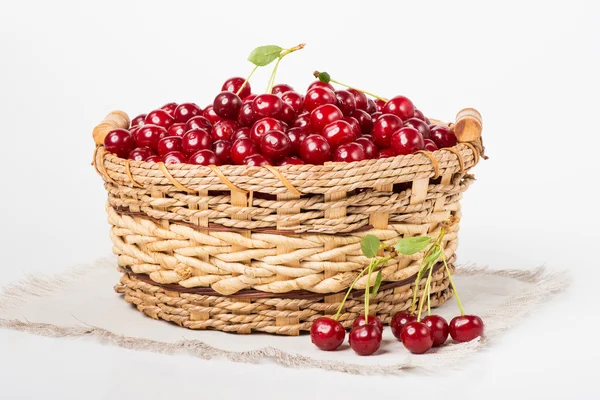 Sweet juicy cherry in basket — Stock Photo, Image