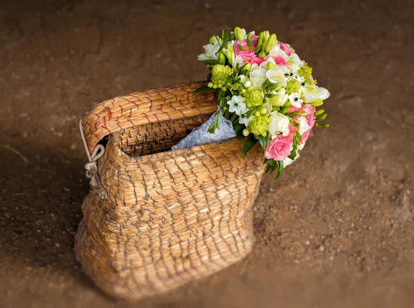 Beautiful bridal bouquet in basket — Stock Photo, Image