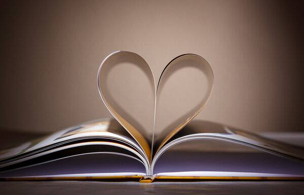 Pages curved into a heart shape