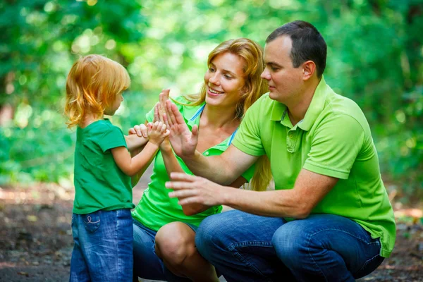 Portrait of Happy Family In Park Stock Photo