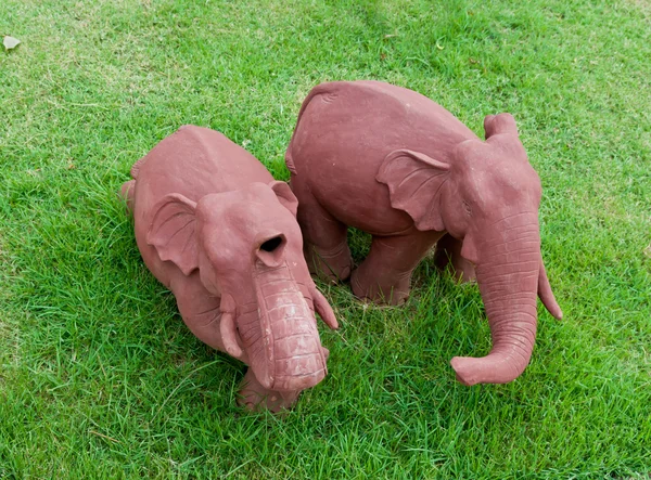 Elephant clay dolls in the garden , — Stock Photo, Image