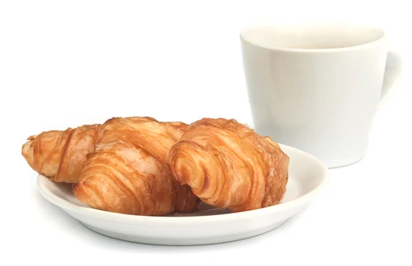 Croissant mit Kaffee. — Stockfoto