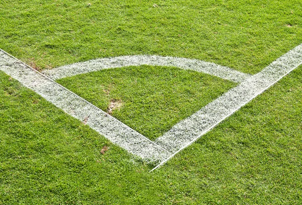 Grama verde e campo de futebol canto — Fotografia de Stock