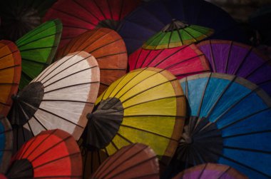 Hand made color paper umbrellas. clipart