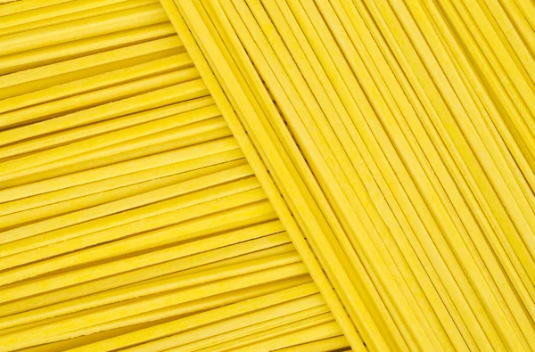 Italiaanse ongekookte spaghetti. — Stockfoto