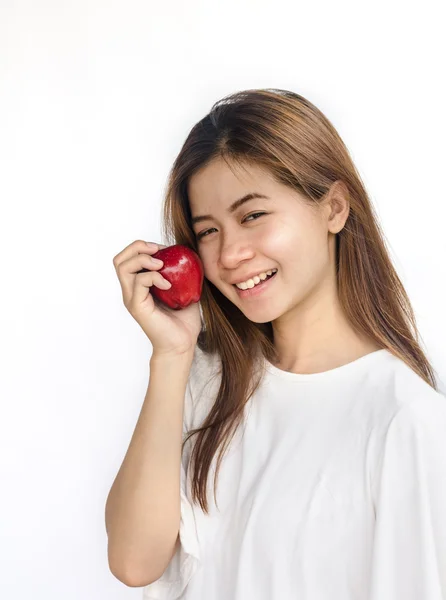 Ung kvinna som håller ett äpple. — Stockfoto