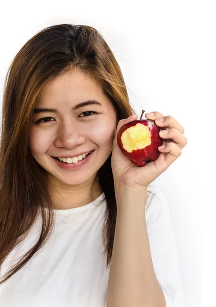 Ung kvinde viser et æble . - Stock-foto