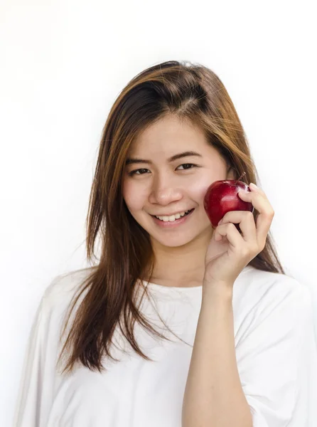 Mujer joven sosteniendo una manzana. —  Fotos de Stock