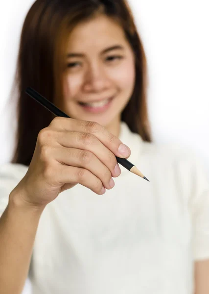 Красавица азиатская девушка с черным карандашом в руках  . — стоковое фото