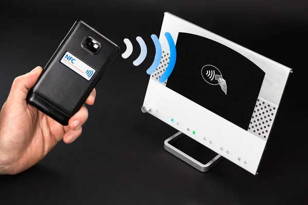 NFC - Near field communication / mobile pay — стоковое фото