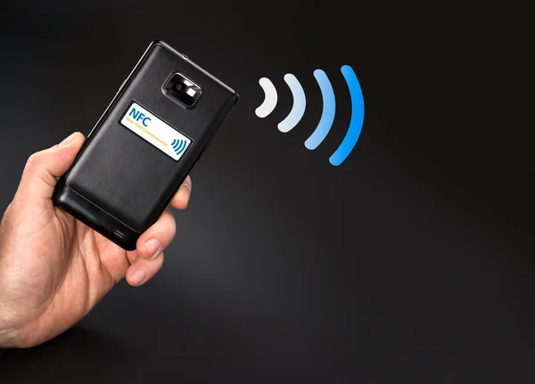 NFC - біля поля зв'язку / мобільний платіж — стокове фото