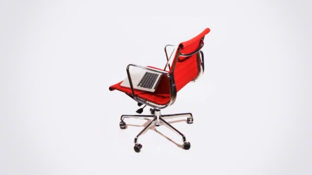 Laptop på en stol — Stockvideo
