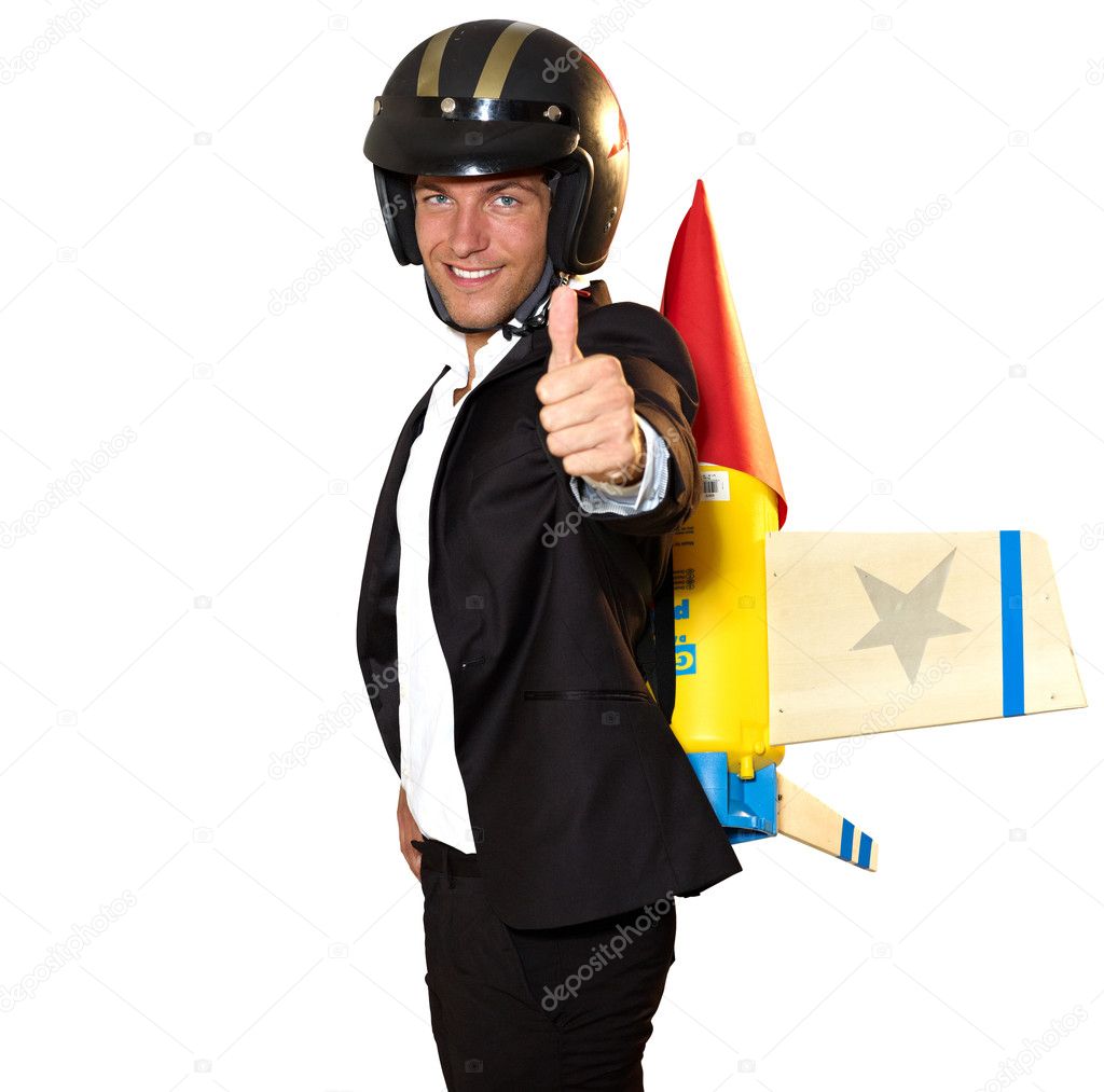 Young businessman with rocket on his back and thumb up