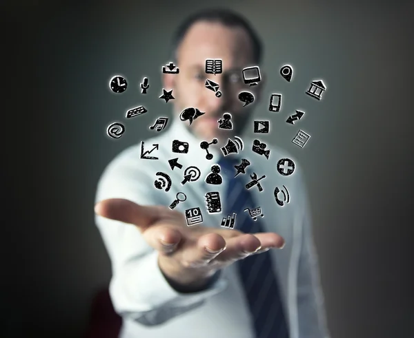 Hand mit einer Wolke von Anwendungssymbolen — Stockfoto