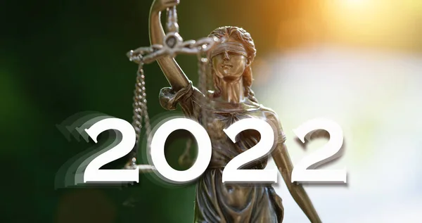 The Statue of Justice - lady justice in lawyer office in year 2022. new year 2022 law concept