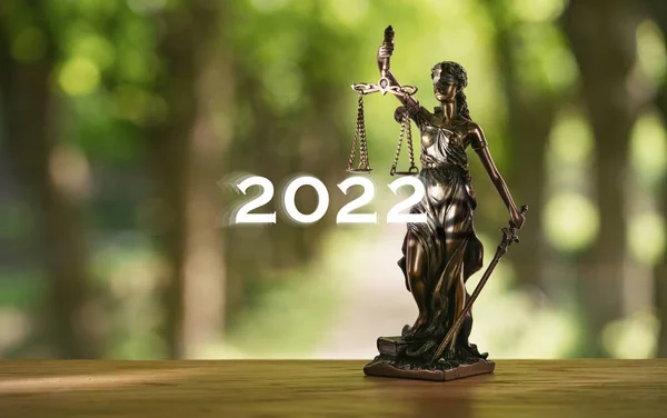 The Statue of Justice - lady justice in lawyer office in year 2022. new year 2022 law concept