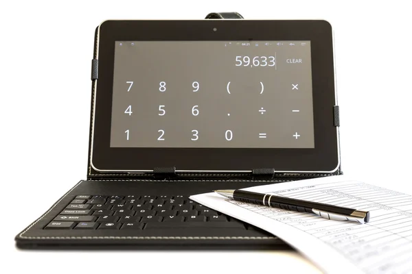 Calculating on digital tablet computer — Stock Photo, Image