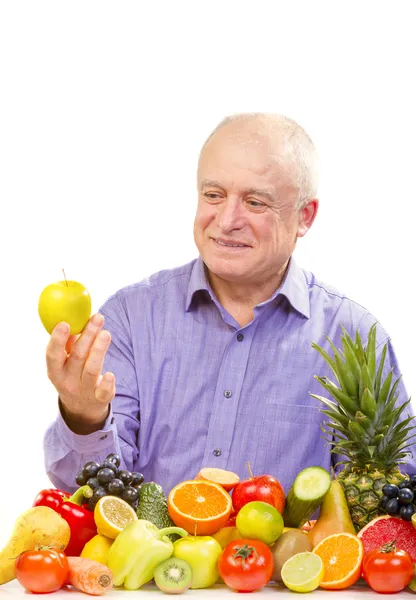 Seniorchef mit grünem Apfel — Stockfoto