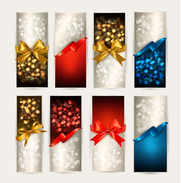 Set di carte regalo colorate con fiocchi regalo con nastri. Vettore — Vettoriale Stock