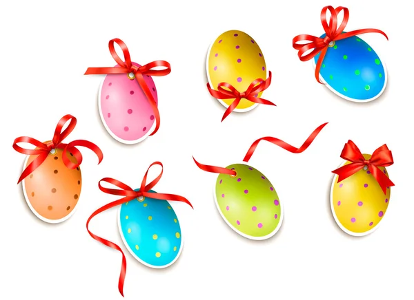 Huevos de Pascua decorativos.Tarjetas de Pascua con lazo rojo y cintas. Ve. — Vector de stock