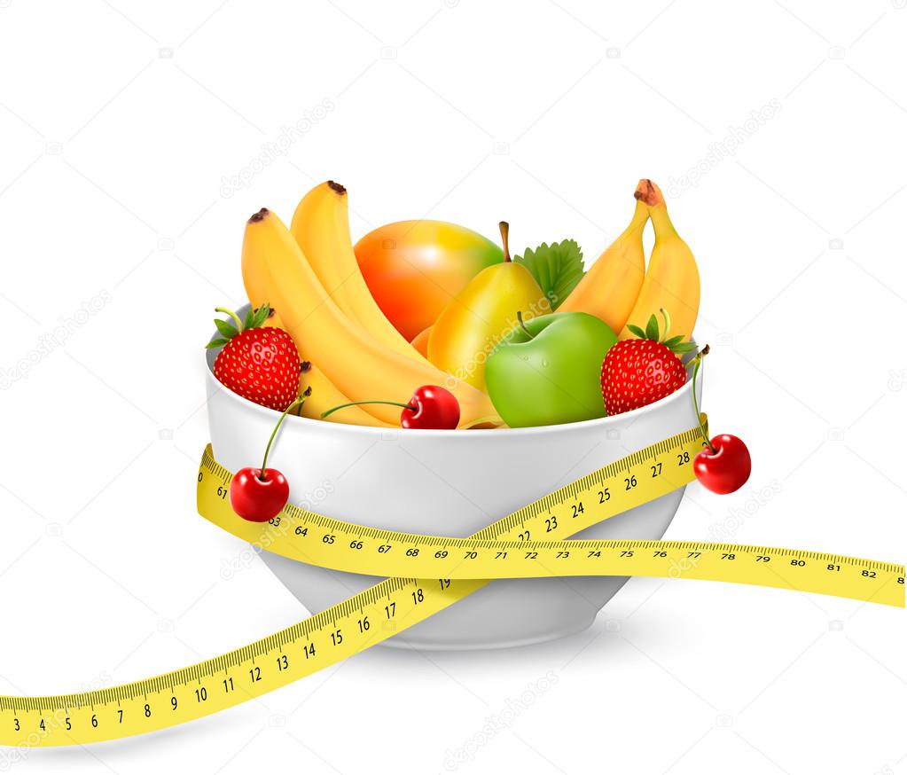 Diet meal. Fruit in a bowl with measuring tape. Concept of diet.