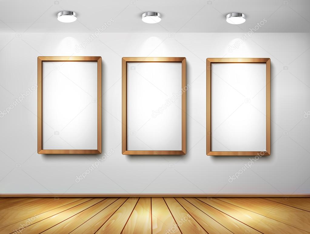 Empty wooden frames on wall with spotlights and wooden floor. Ve