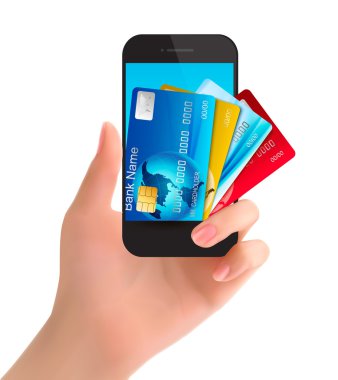 kredi kartları içinde bir telefon. İnternet Bankacılığı kavramı. vektör