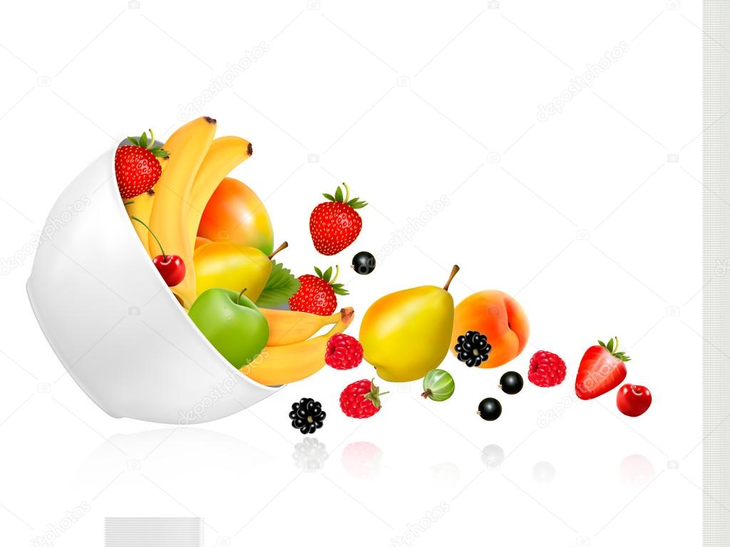 Fruit and berries falling from a bowl. Concept of healthy eating
