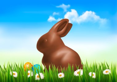 çikolata bunny Paskalya yumurtaları çim ile. vektör.