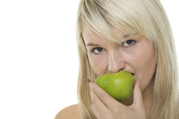 Woman with half eaten pear — Stock Photo, Image